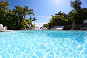 Fototapeta na wymiar Closeup of private swimming-pool on sunny day