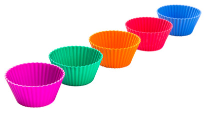 Cupcake silicone baking cups over white background 