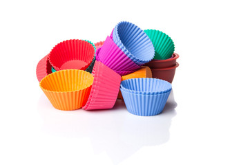 Cupcake silicone baking cups over white background 