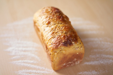 A loaf of freshly baked wholemeal bread