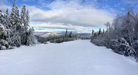 Snowy slope in the mountains