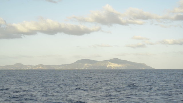 view from the sailing vessel to island Eolie.  Volcano Stromboli in Sicily, Italy