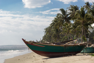 Fototapeta na wymiar Fishing boat on the beach