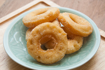 closeup of a pile of rosquillas, thai donuts