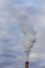 Fototapeta na wymiar Industrial cityscape with coal power plant and smoke stacks