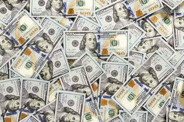 One hundred dollars pile as background
