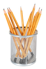 Wooden pencils in metal vase isolated on white background