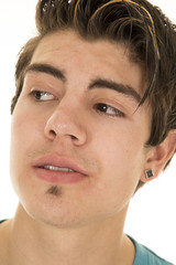 Obraz premium man head close earings look side