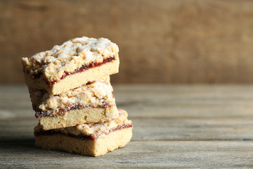 Tasty homemade pie on wooden table