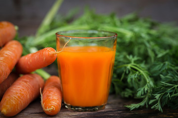 Carrot  on wooden background