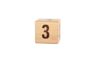 number 3 on the wooden cube