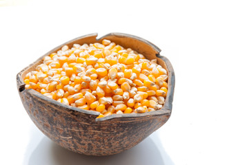 corn in burlap bag on white background