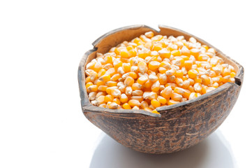 corn in burlap bag on white background