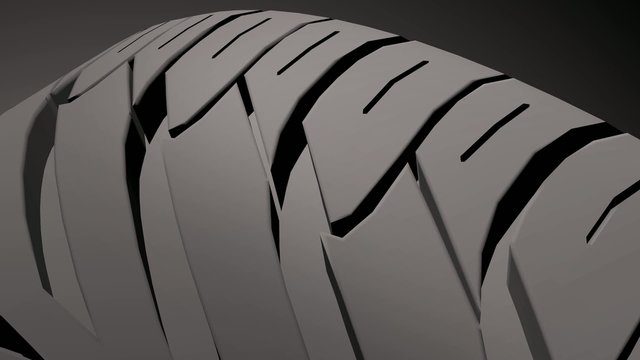 Close up on a car tire in motion