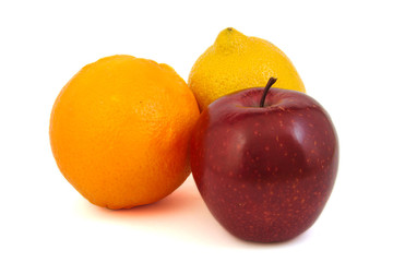 Red apple, yellow lemon and an orange