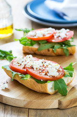 Feta with tomato and rocket sandwich