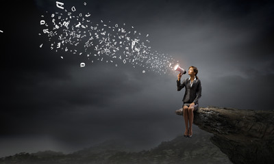 Obraz premium Businesswoman with megaphone