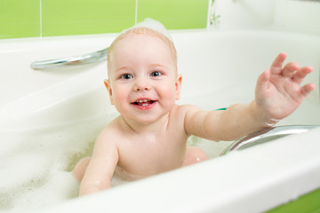 toddler child boy taking a bath