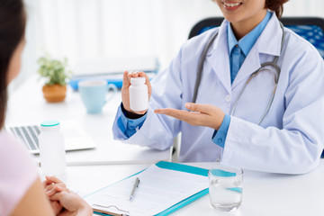 Showing bottle of pills