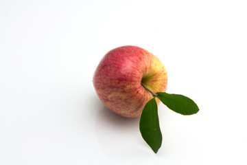 Ripe apple with leaf