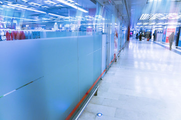 people walk under the subway