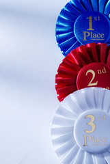 Set of three winners rosettes and ribbons
