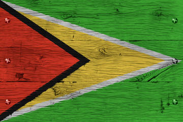 Guyana national flag painted old oak wood fastened