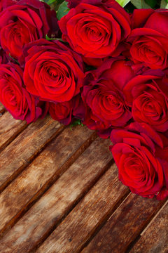 dark red roses  on table