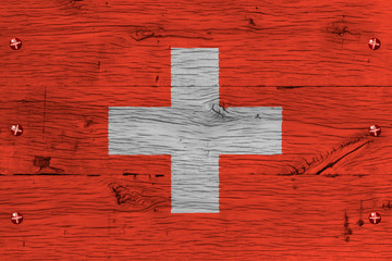 Switzerland national flag painted old oak wood fastened