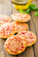 mini pizza on wooden table
