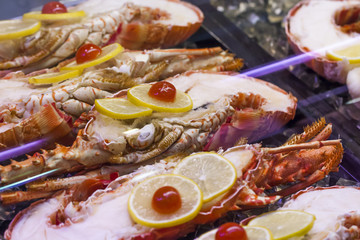 assortment of cooked lobsters with decoration