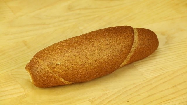 Bran muffin on a wooden boards background