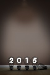 Composite image of 2015 with light bulb