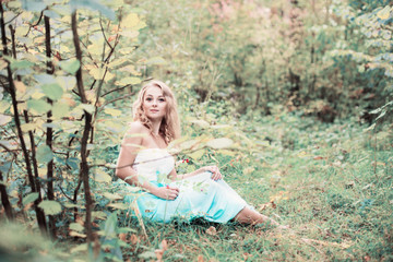 romantic woman in fairy forest