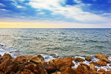 rocky beach at sunset, Haifa, Israel