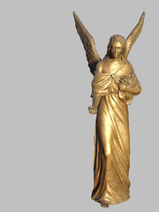 Bronze angel sculpture. Isolated on gray