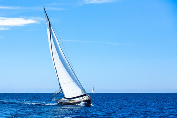 Sailing. Sailboat participate in sailing regatta. Luxury yachts.