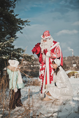 Fototapeta premium Father Frost and the Snow Maiden with gifts 1457.