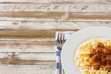 Hungarian goulash of veal with dumplings with empty place
