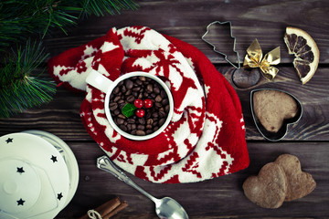 Gingerbread cookies and spices over wooden background 
