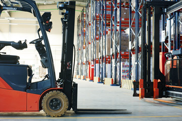 forklift loader stacker truck at warehouse