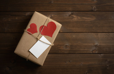 gift for Valentine's Day with red hearts