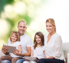 happy family with tablet pc computers