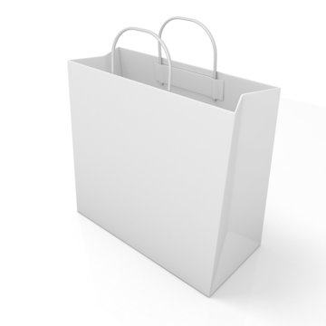 Empty shopping paper bag, isolated on white. Side view