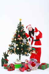 산타 복장을 한 여자 소녀와 선물들