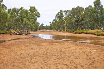 Water begins to flow in an outback river in Australia.