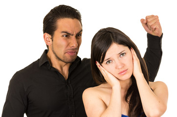 young attractive girl covering ears from angry screaming husband