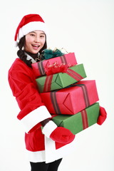 산타 복장을 한 소녀와 선물