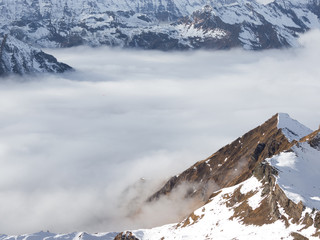 Fototapeta na wymiar white clouds in the Alps