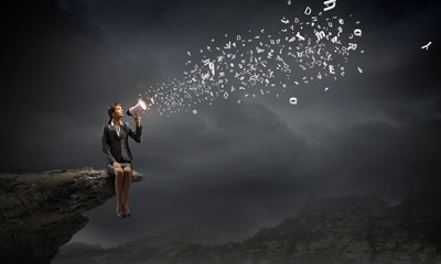 Obraz premium Businesswoman with megaphone